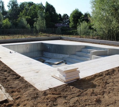 frateur-piscines-amenagement-exterieur construction de piscine en béton